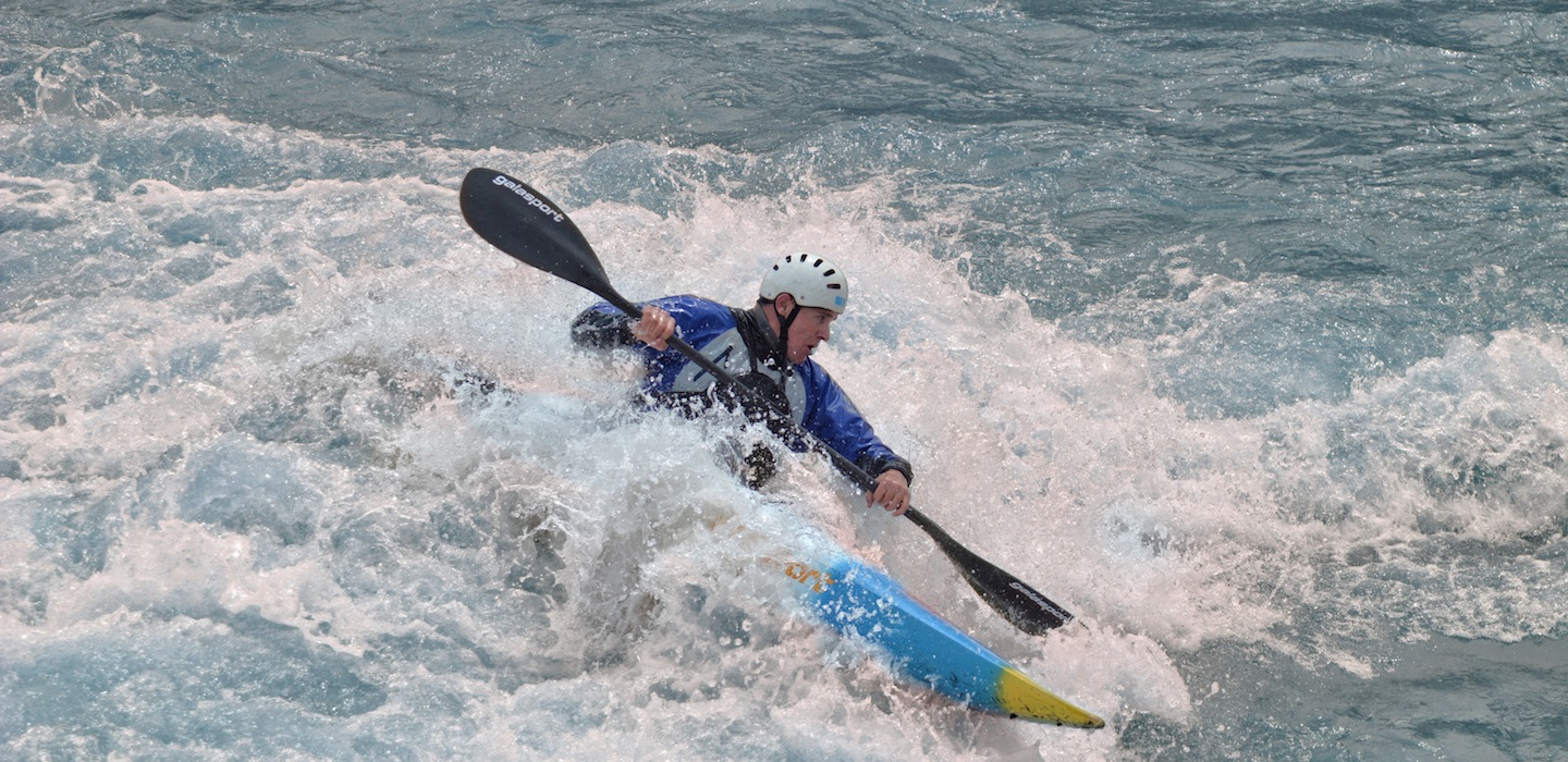 Image of Man in Whitewater Kayak at RIVERSPORT Rapids